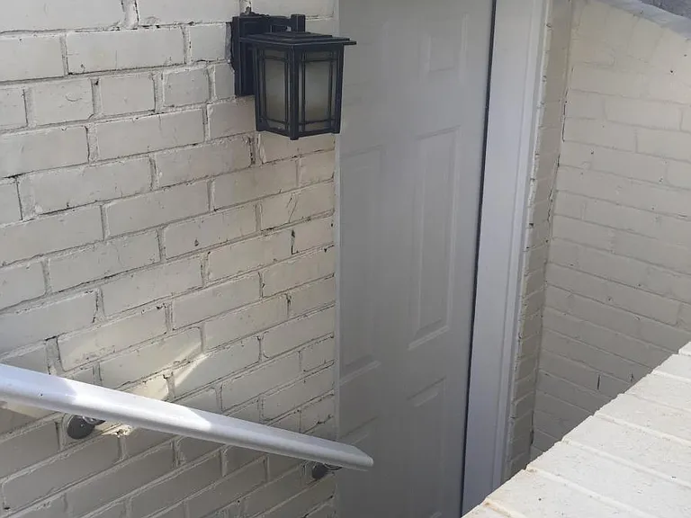 Stairs and doorway to apartment