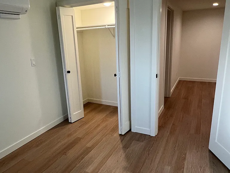 Spacious double-door bedroom closet