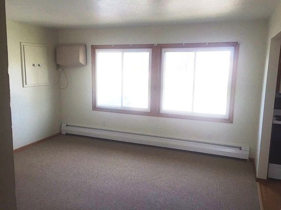 Living Room that is connected to the Kitchen