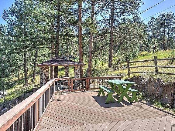 Dining/sunroom flows to deck