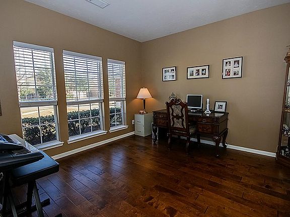 Study or Office with Natural Lighting and nice Hardwood Flooring.