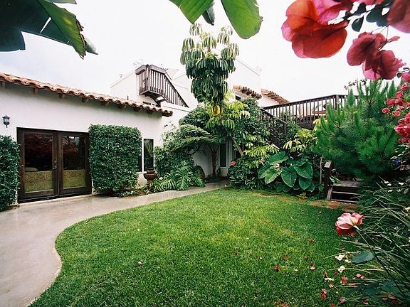 Private yard with multiple entrances to house