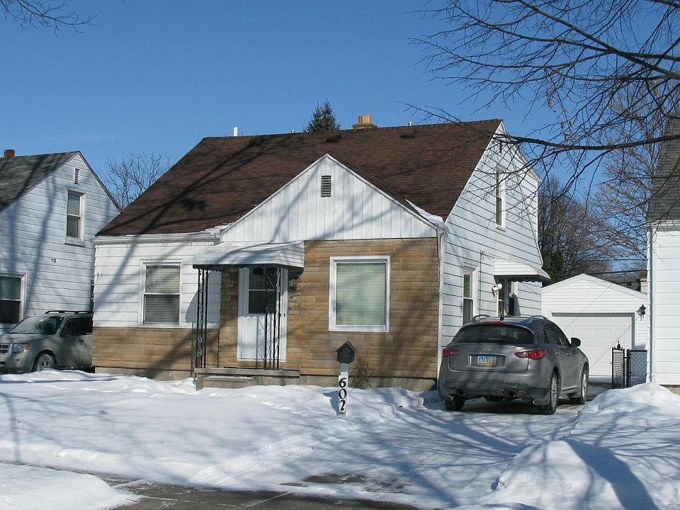 View of home from street in winter