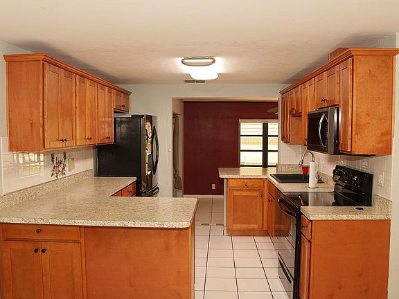 1006 -Kitchen w/ Florida Rm