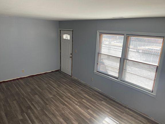living room with new laminate flooring.