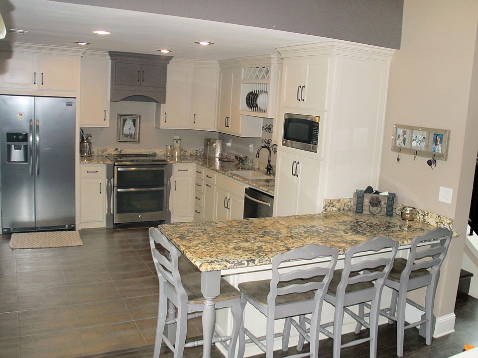 looking into kitchen from breakfast/dining area