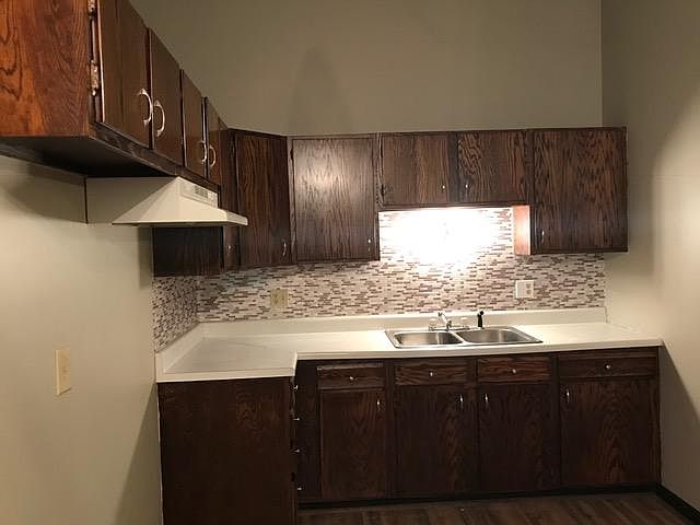 Kitchen with newly refinished cabinets