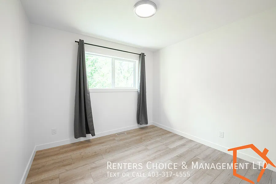 New 2 Bedroom Main Floor Unit With Assigned Parking — Photo 4