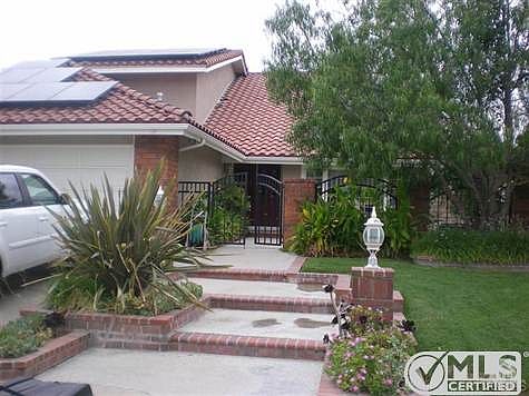 3 Car Garage, gated entry courtyard.