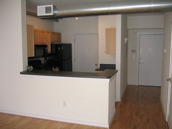 Convenient Kitchen Overlooks Living Area!