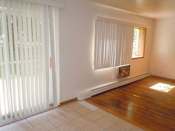 View of Spacious Living Room and Eat-In-Area