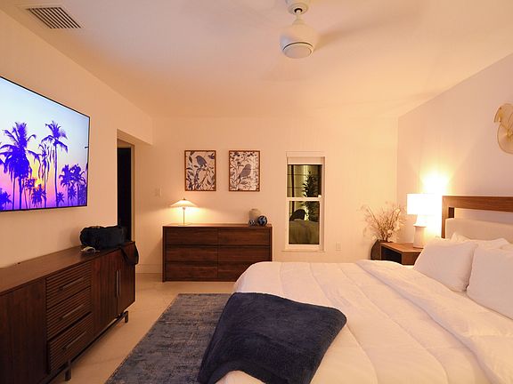 Master bedroom, 70" smart TV, master bath ensuite, large walk in closet