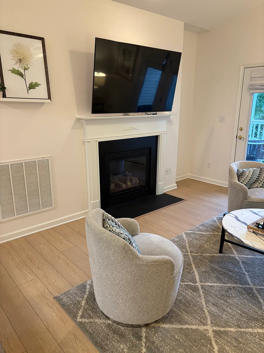 living area - 65" HDTV; gas logs fireplace - 319 College Rd #302