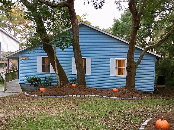 Large landscaped front yard