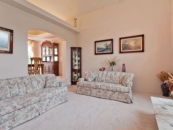 Attention to quality and design details include beveled corners, arched doorways, elevated display areas and recessed/accent lighting.