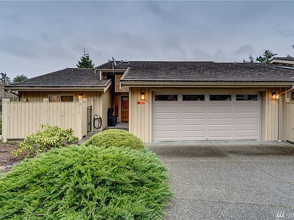 The condo has an attached 2-car garage and shares only one common wall with the neighboring unit.  