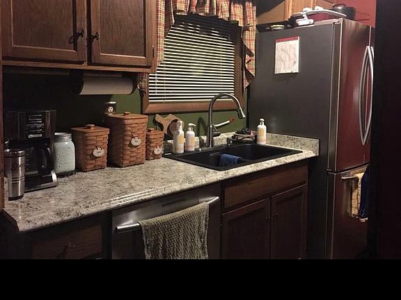 Galley kitchen with stainless steel appliances!