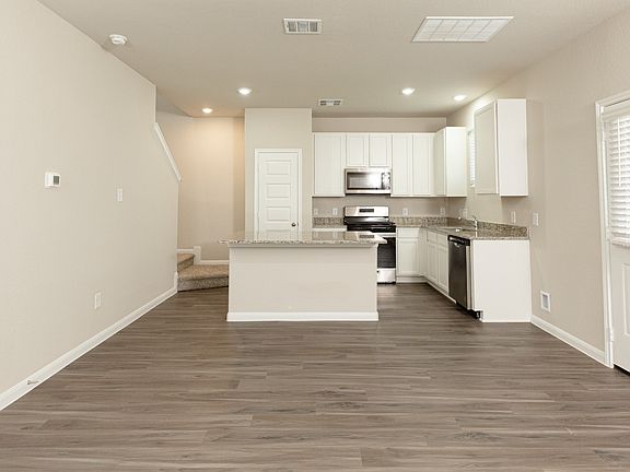 Family Room to Dining Area and Kitchen
