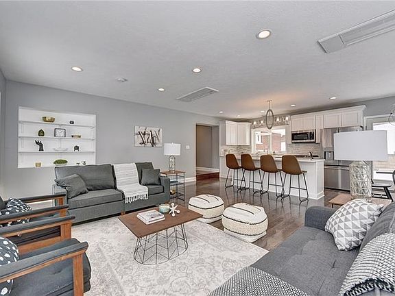Welcome to the completely brand new great room featuring a stunning open floor kitchen to dining/living space.