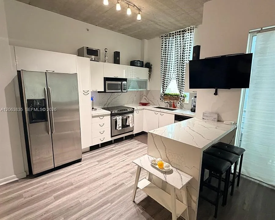 133 NE 2nd Ave #401