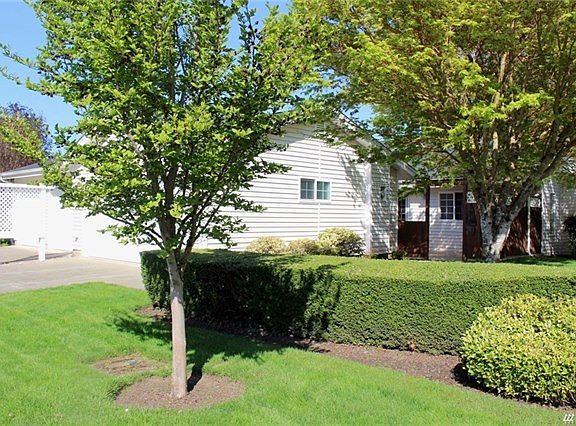 Attractive courtyard entrance with private front patio.