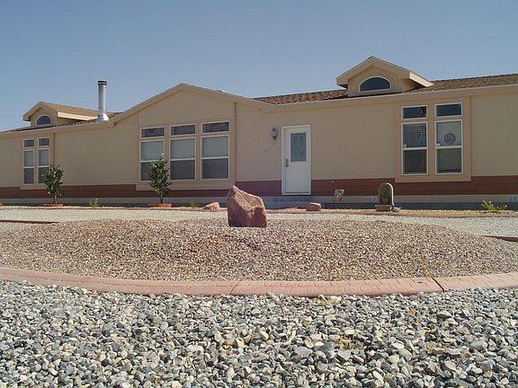 Well landscaped w/mature trees.