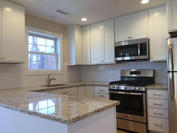 Kitchen w/ stainless steel appliances, gas range stove for cooking
