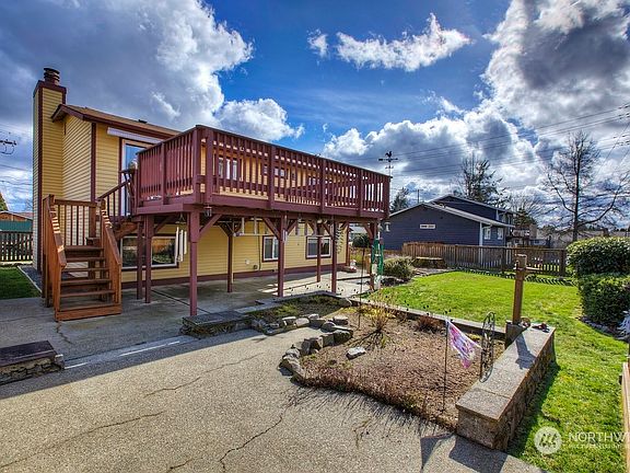 Enjoy the deck with stairs leading down to the back yard.>