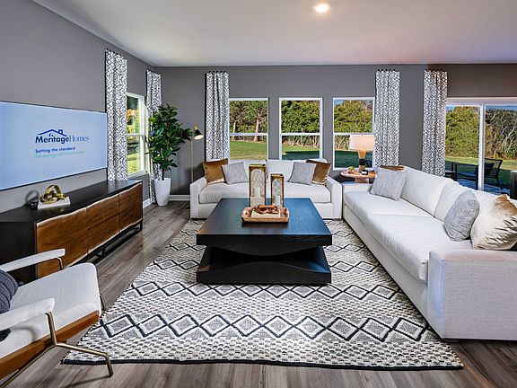 Enjoy movie nights in the spacious great room. Photography from Holland Park.