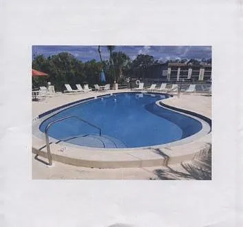Building Photo - 102 Capri Isles Blvd #110