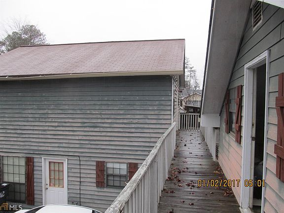 Entry way to office/storage above garage.