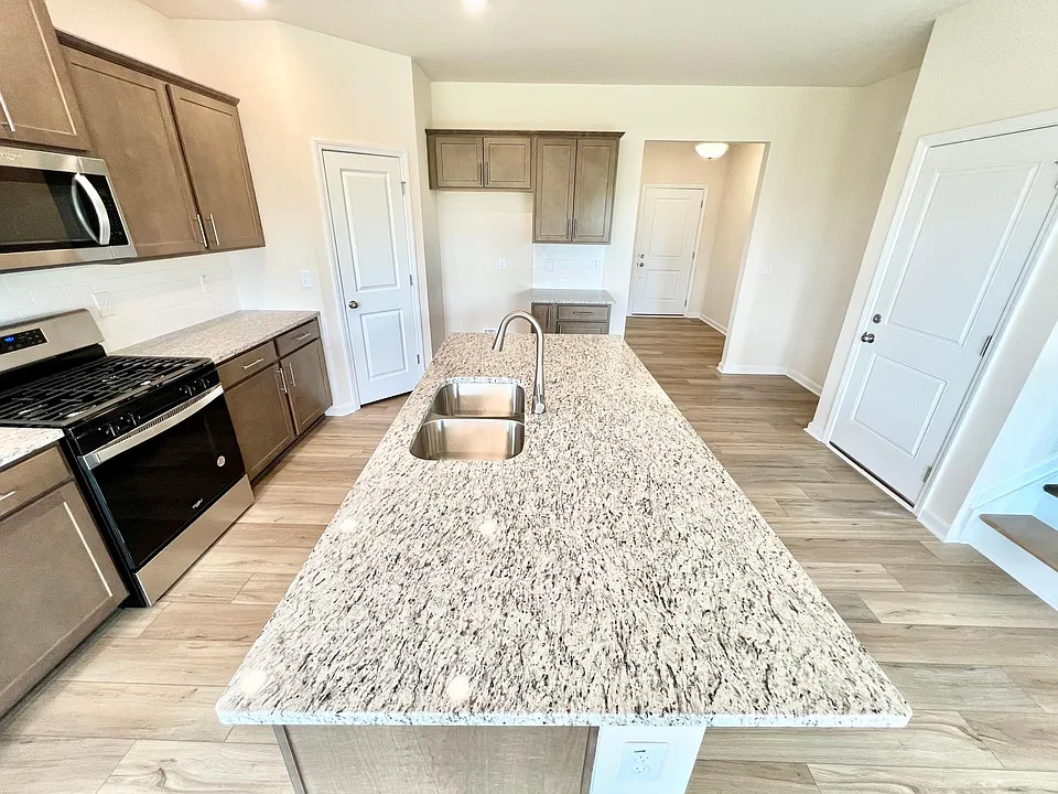 Large Granite Kitchen Island.