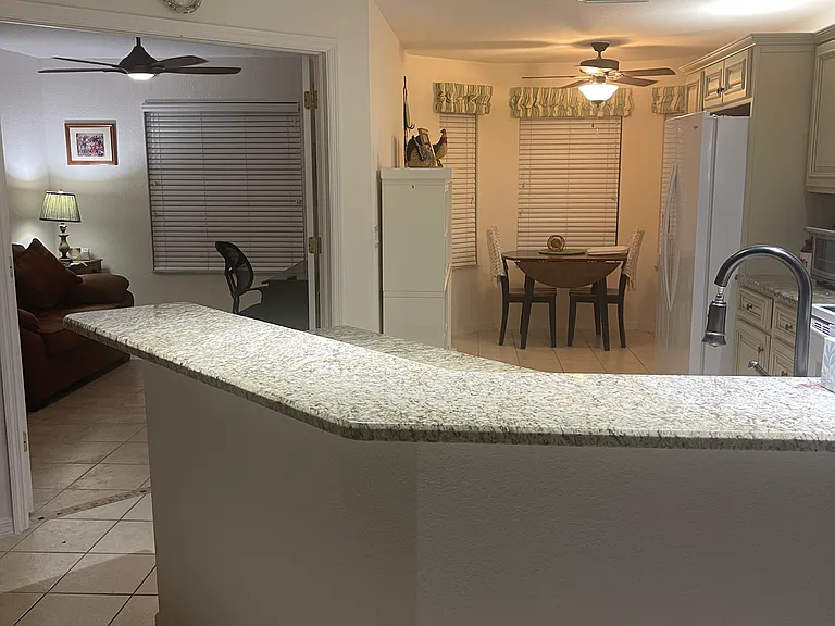 Looking into the kitchen and left is the office