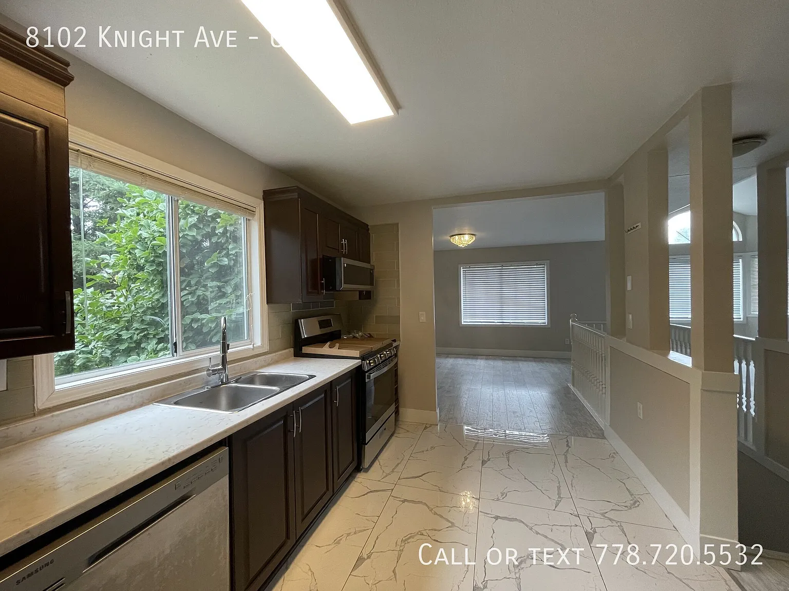 Upper Suite with 3 Bedrooms plus Den and 2 Baths — Photo 2