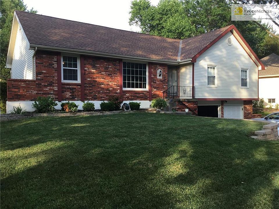 Raised ranch with vinyl siding
