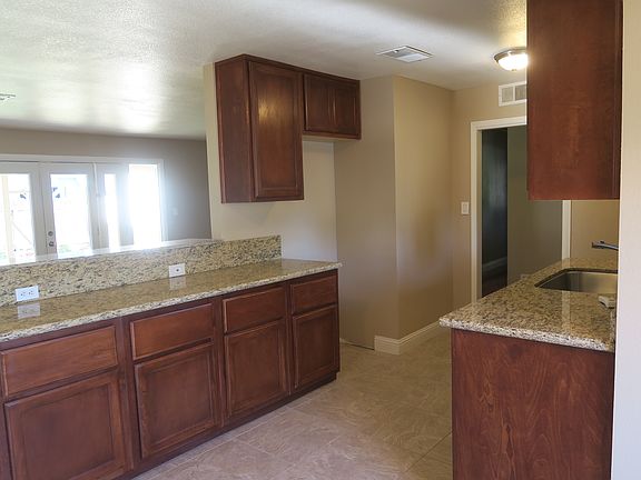 Kitchen with granite counter
