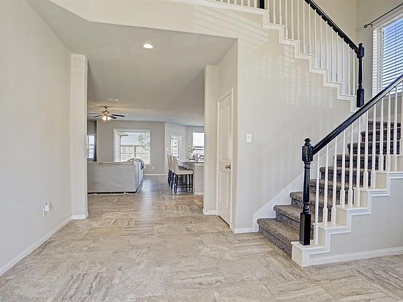 Spacious and welcoming formal entryway.