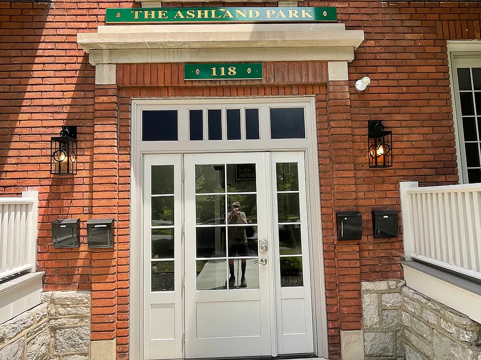 The sign above the front door is new but the "Ashland Park" name of 118 Desha dates back decades.