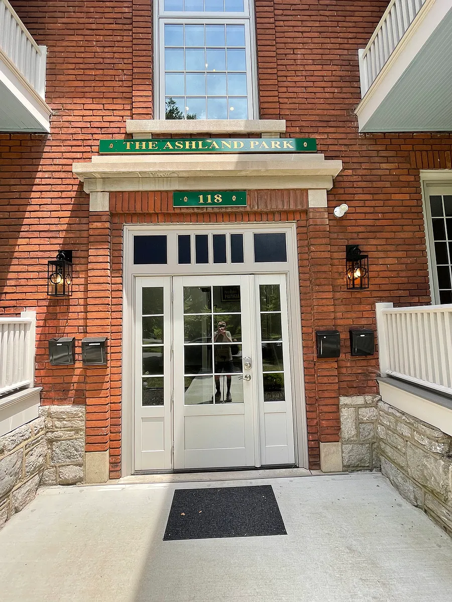 The sign above the front door is new but the "Ashland Park" name of 118 Desha dates back decades. - 118 Desha Rd #4