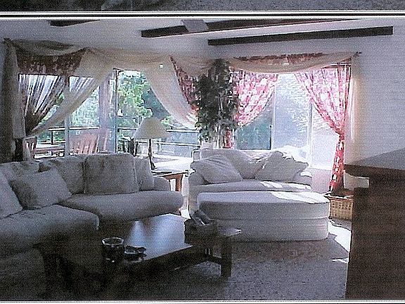 Living Room w/ fireplace on each floor
