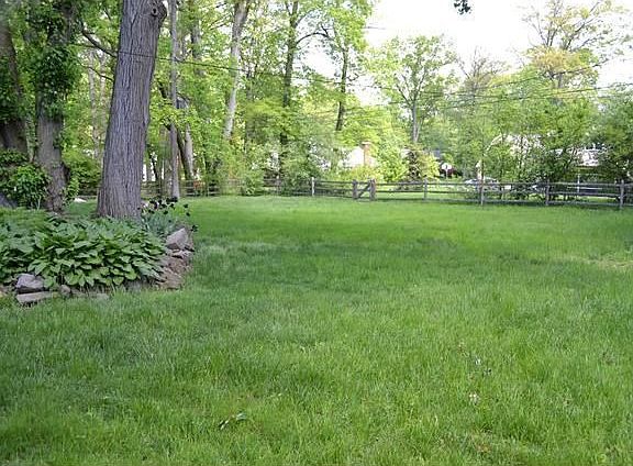 Large fenced 1/2 acre lot