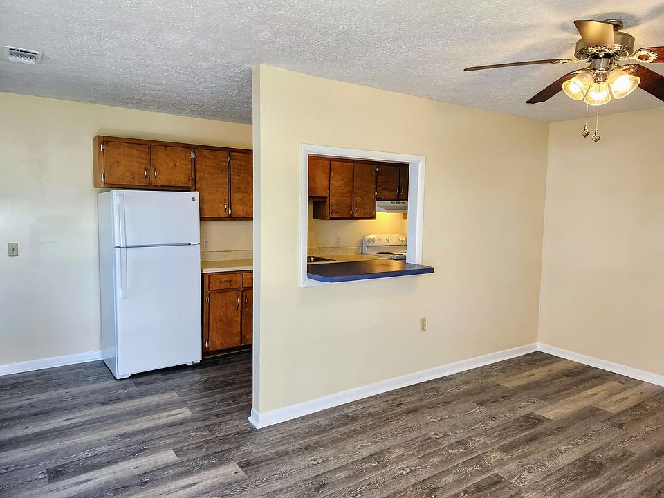 Bar separates the living room and kitchen.
