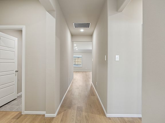 Entryway in the Harper home plan by Trophy Signature Homes - REPRESENTATIVE PHOTO