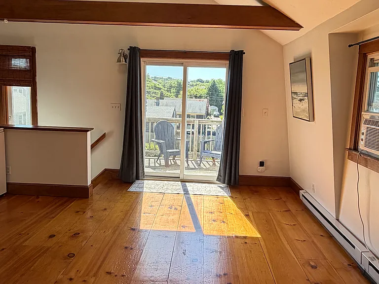 Living Room with access to private deck