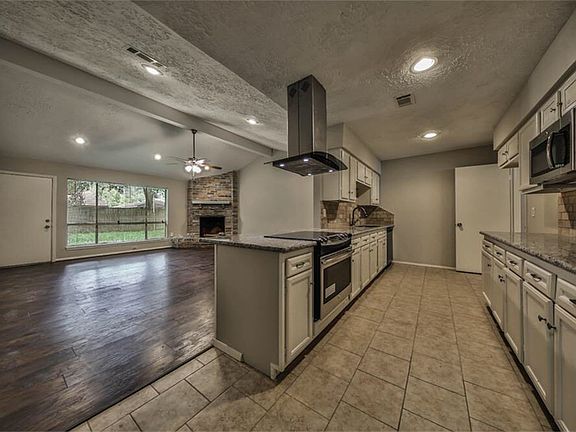 Beautifully updated kitchen over looks spacious living area