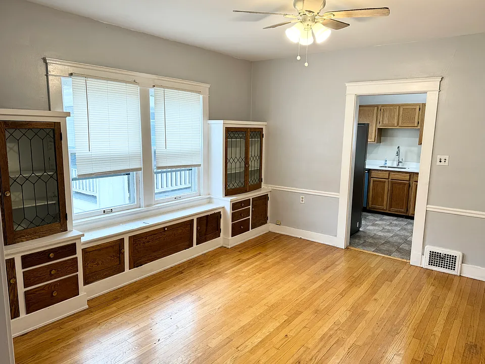 Dining room with charming built-in cabinets
