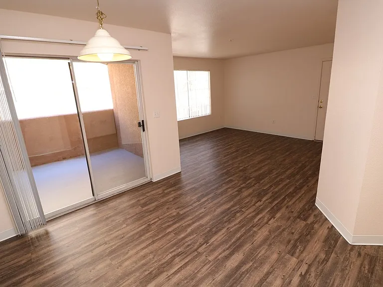 Spacious living area with access to large private patio