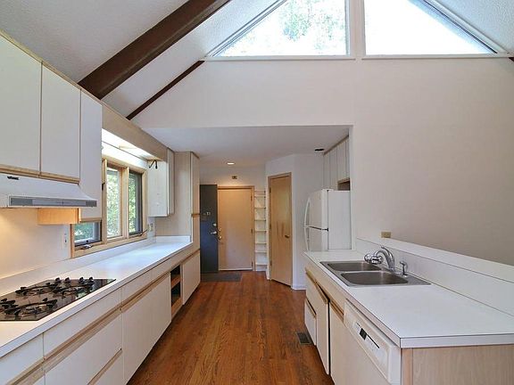 Open concept kitchen with skylights