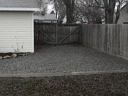 Extra parking/fence opens to front yard for RV sized access