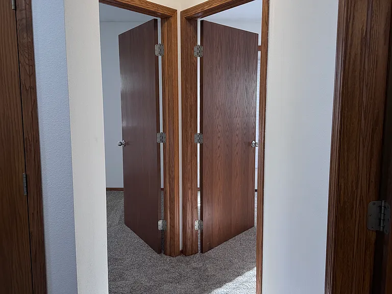 Hallway to both bedrooms.